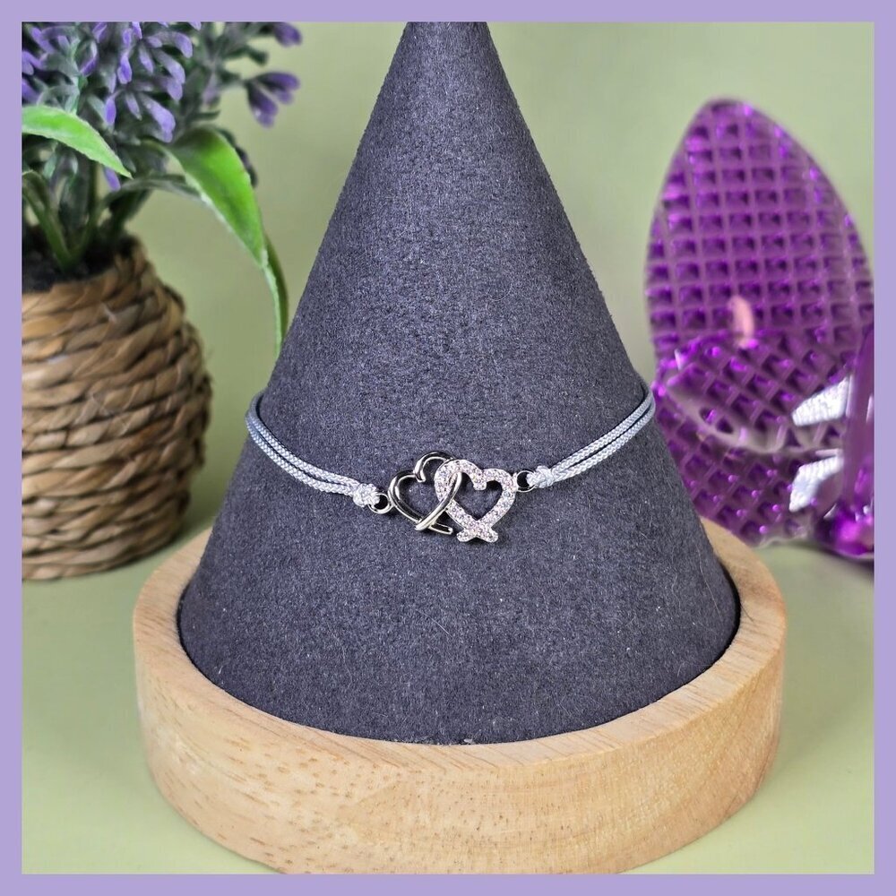 Sterling Silver Interlocking Hearts Bracelet With‎ Adjustable Corded Band (NWOT)